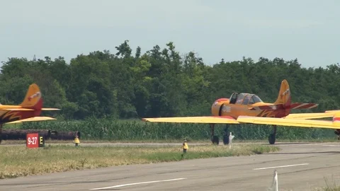 Aerplanes one after another rule from parking lot in direction of runway. Stock Footage 106491982