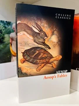 Aesop's Fables from Collins Classics edition with a rabbit and tortoise ill.. Stock Photos