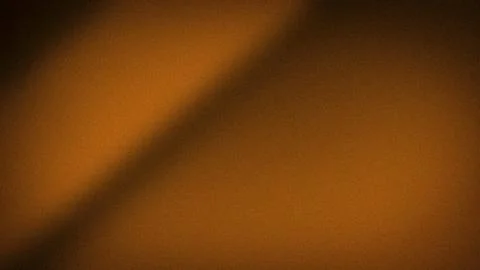 Aesthetic 4K grainy gradient background with modern orange brown and black .. Stock Photos