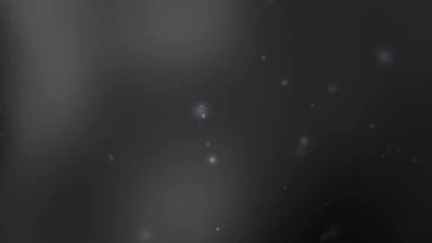 Aesthetic black gray gradient background with faint white specks Video stock 297686567