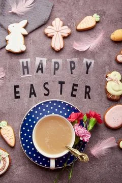 Aesthetic Easter background with text Happy Easter. Stylish decorated Easter Stock Photos