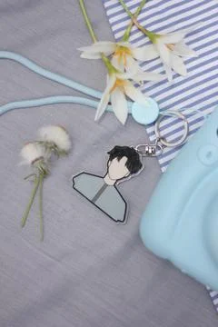 Aesthetic Flat Lay Boy Character Keychain Charm Still Life Image Stock Photos