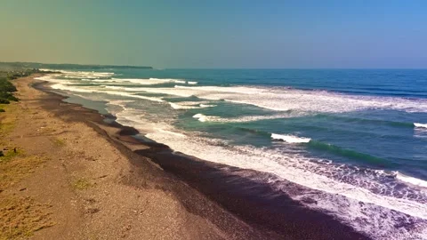 Aesthetic Green Ocean Waves Rolling Along Tropical Coast Aerial View Stock Footage 337475702