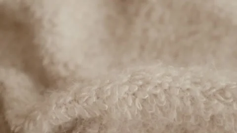 Aesthetic video of hands touching soft ivory wool fluffy sweater. Stock Footage 325345327