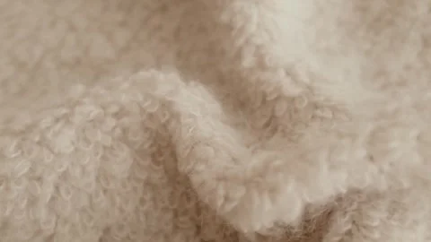 Aesthetic video of hands touching soft ivory wool fluffy sweater. Stock Footage 325345362