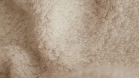 Aesthetic video of hands touching soft ivory wool fluffy sweater. Stock Footage 325345363
