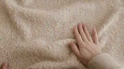 Aesthetic video of hands touching soft ivory wool fluffy sweater. Stock Footage 325345430
