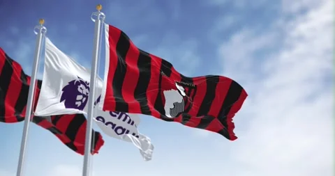 AFC Bournemouth flags waving with Premier League flag on a clear day Stock Footage 256237219