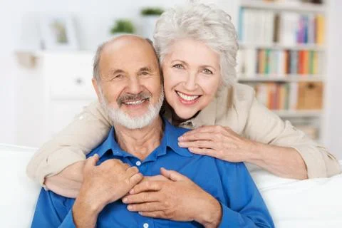 Affectionate elderly couple Stock Photos