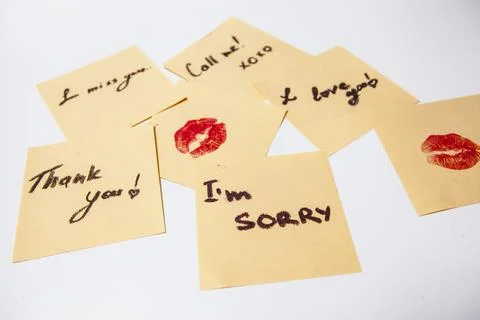 Affectionate love notes on yellow papers Stock Photos
