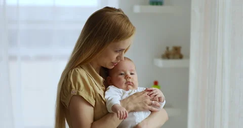 Affectionate millennial mum cuddle nice Stock Video Pond5