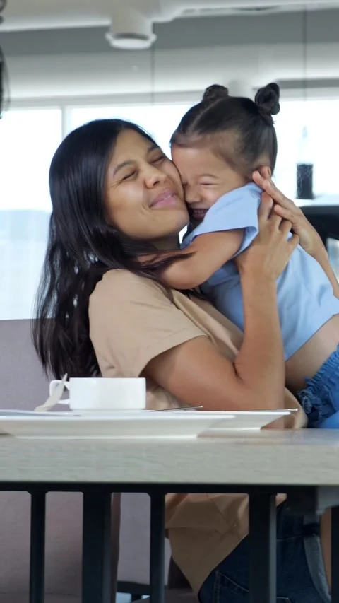 Affectionate mother hugging her happy laughing daughter Stock-Footage 341189110