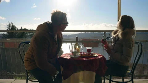 Affectionate young couple enjoying weekend spending time together in a cozy Stock Footage 233107842