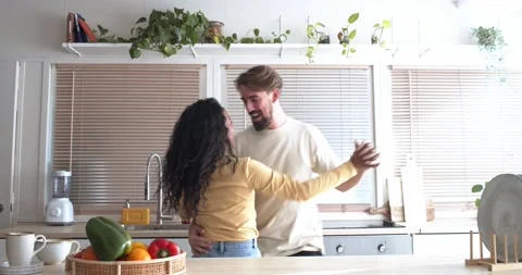Affectionate young couple in love dancing at home, having fun. Stock Footage 175401861