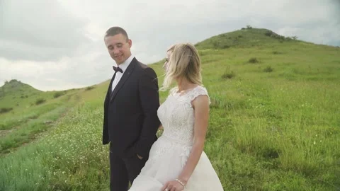 Affectionate Young Couple Slow Dance in a Field Together Stock Footage 233712966