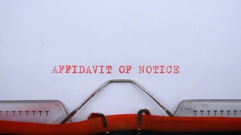Affidavit of notice - phrase printed on an old typewriter in red letters Stock Footage 128400889