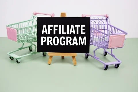 Affiliate Program text message and trolley shopping cart on green background Foto stock