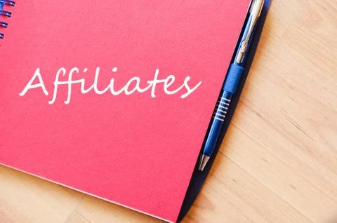 Affiliates write on notebook Stock Photos