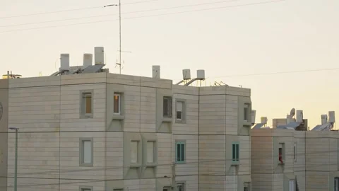 Affordable housing complex project with water heating tanks on rooftops in 動画素材 333578164