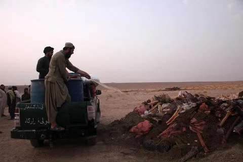 Afghan authorities destroy seized narcotics in Kandahar, Afghanistan - 20 Jul 20 Stock Photos