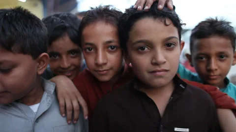 Afghan children looking at camera Vidéo 37758220