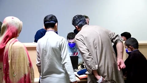 Afghan evacuees processed in on arrival at Ramstein Air Base, Germany Stock Footage 160106684