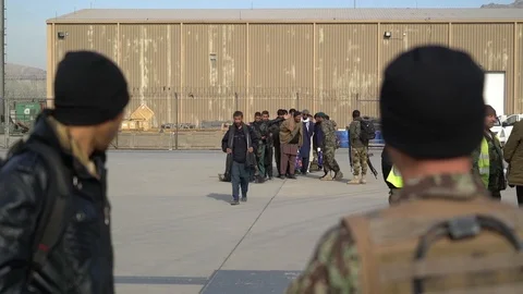 Afghan men participate in Casevac exercise with U.S. Airmen Stock Footage 103586829