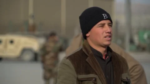 Afghan men particpate in CASEVAC exercise Stock Footage 103586848