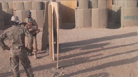 Afghan police and soldiers are taught tactics by the U.S. army. Stock Footage