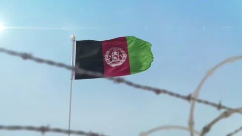 Afghanistan  flag behind border Stock Footage