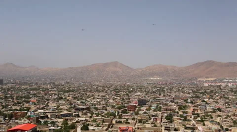 AFGHANISTAN HELICOPTERS BLACK HAWK KABUL MOUNTAINS HINDU KUSH Stock Footage