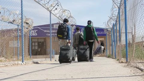 Afghans return from Iran through the Islam Qala border in Herat, Afghanistan - 1 Stock Photos