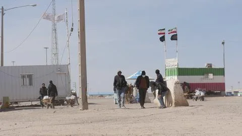 Afghans return from Iran through the Islam Qala border in Herat, Afghanistan - 1 Stock Photos