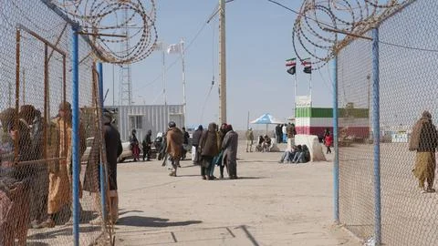 Afghans return from Iran through the Islam Qala border in Herat, Afghanistan - 1 Stock Photos