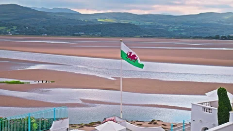 Afon Dwyryd, a river of two fords with the Welsh flag. Stock Footage 255158440
