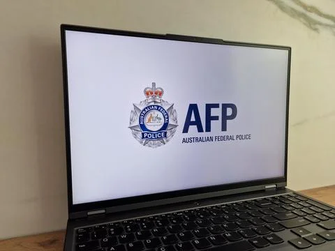 AFP logo displayed on laptop Stock Photos