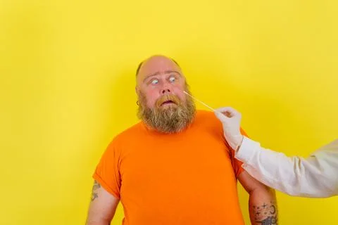 Afraid man is afraid to get covid19 test Stock Photos