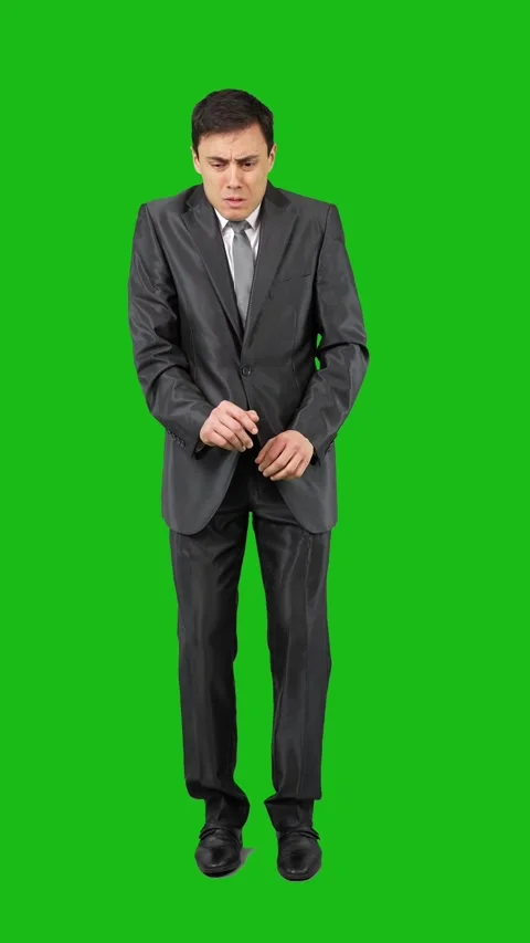 Afraid man in light studio. Chroma key Video stock 241197112