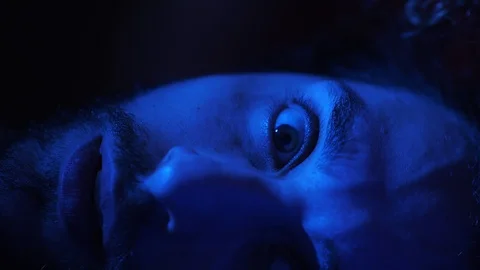 Afraid man waking up after a nightmare, horrible dream- close up portrait Stock Footage 103610556