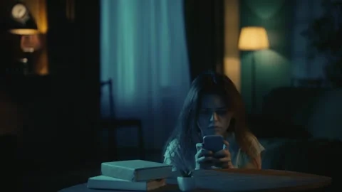 Afraid young girl with baseball bat standing near the window, runs to the table Stock Footage 250421103
