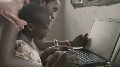 Africa child computer lesson class teacher Stock Footage