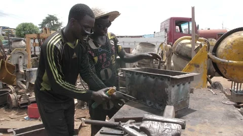 Africa local welder working with iron and welding machine Stock Footage 156419341