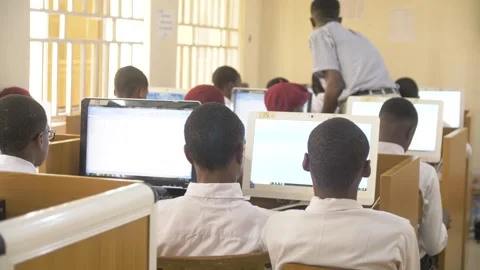 Africa School students inside  school classroom  with computer e learning 動画素材 251658537