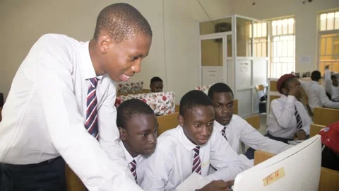 Africa School students inside  school classroom  with computer e learning Stockbeeldmateriaal 251664501