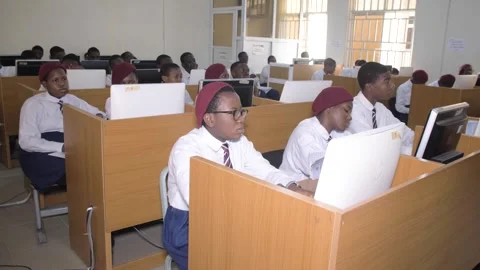 Africa School students inside  school classroom  with computer e learning Stockbeeldmateriaal 252308268