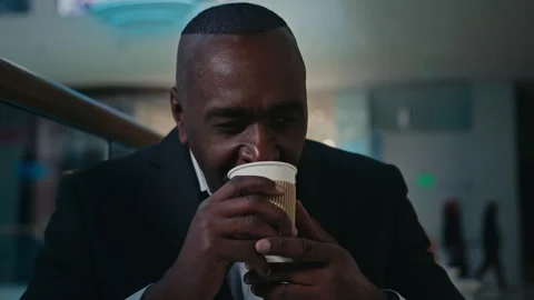 African adult middle-aged man drinking Stock Video Pond5