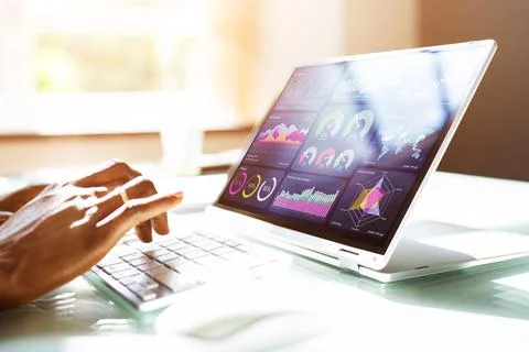 African Advisor Using KPI Dashboard Stock Photos