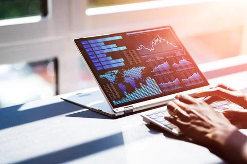African Advisor Using KPI Dashboard Stock Photos