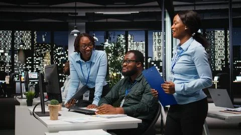 African american analysts collaborating on a project with financial forecasting Stock Photos