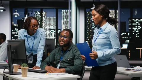 African american analysts collaborating on a project with financial forecasting Stock Photos